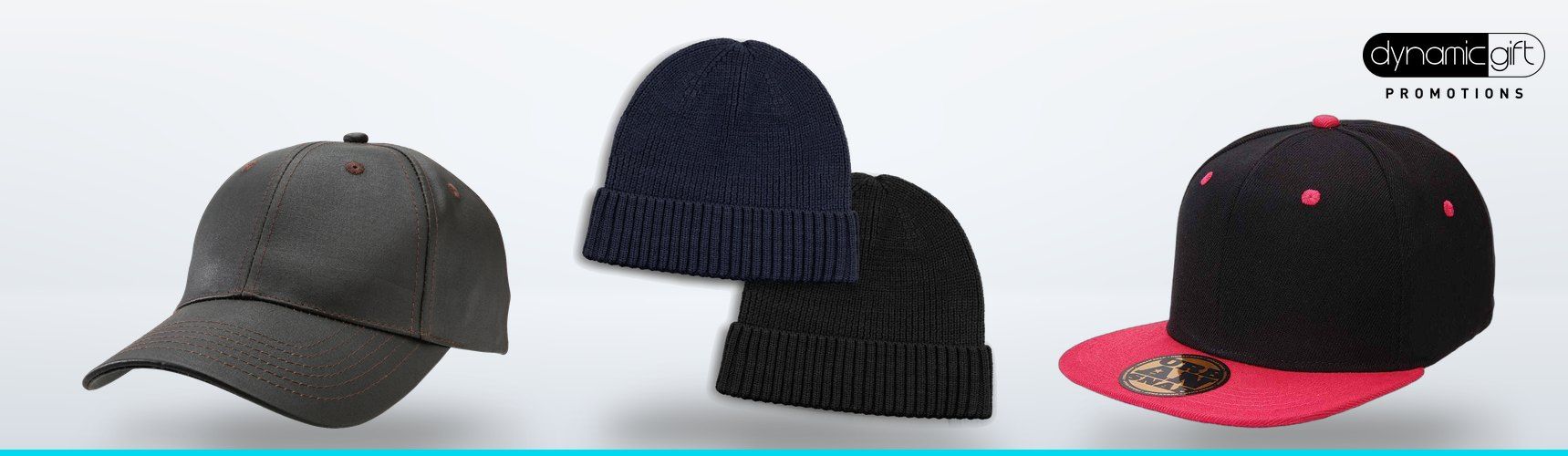 Brown oilskin look cap, navy and black knitted beanies and a black snapback with a pink peak on a light background