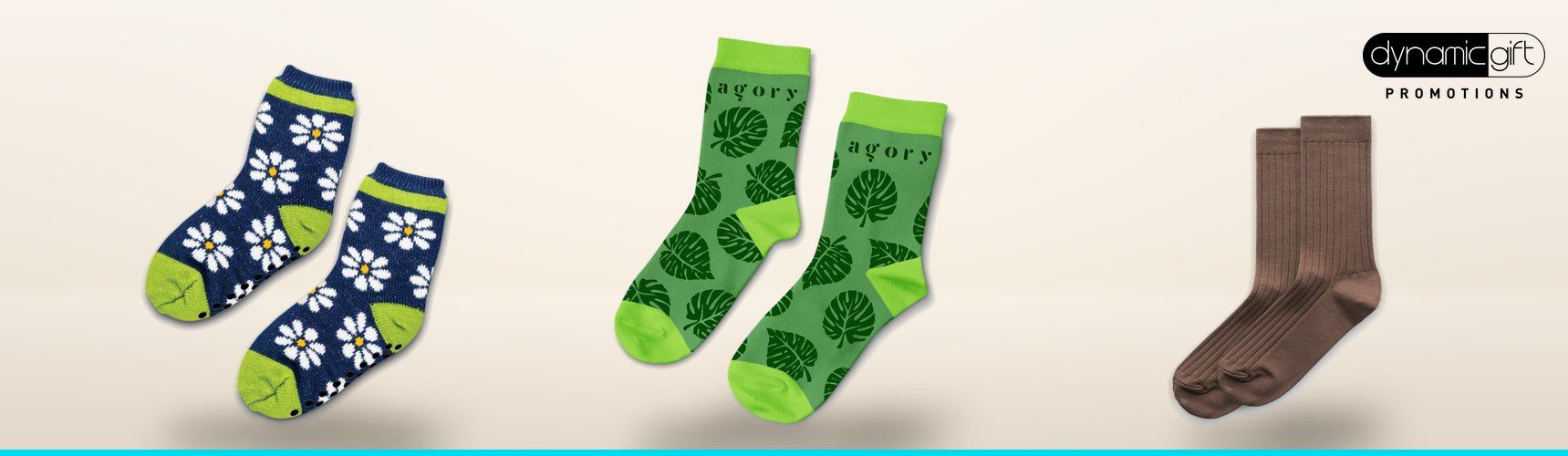 Kids grip socks with daisies, custom printed leaf crew socks and brown ribbed socks lined up on a light background