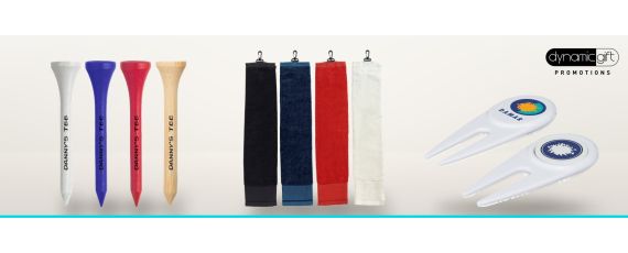 Custom printed golf tees, clip on golf towels in four colours and branded divot repairers lined up on a light background